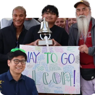 boy celebrating with supportive community