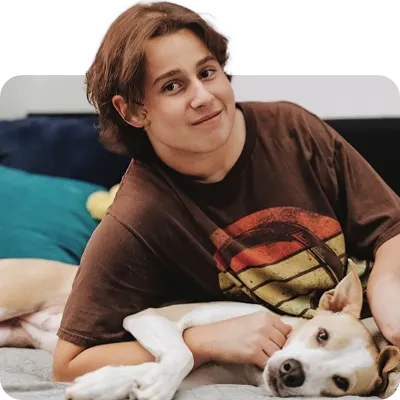 teen with pet dog